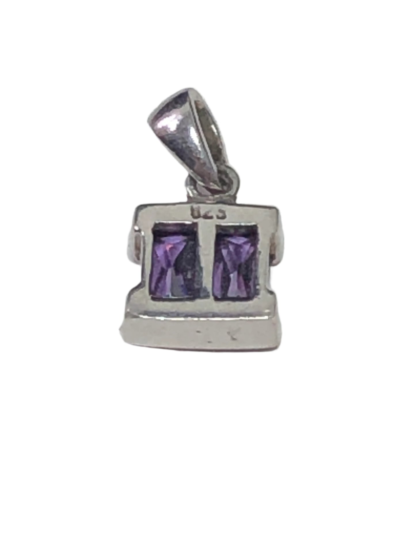Add a pop of color with this sterling silver pendant featuring two violet cubic zirconia stones in a sleek bezel setting. The brilliant sparkle and rich purple hue give the look of luxury at an accessible price.