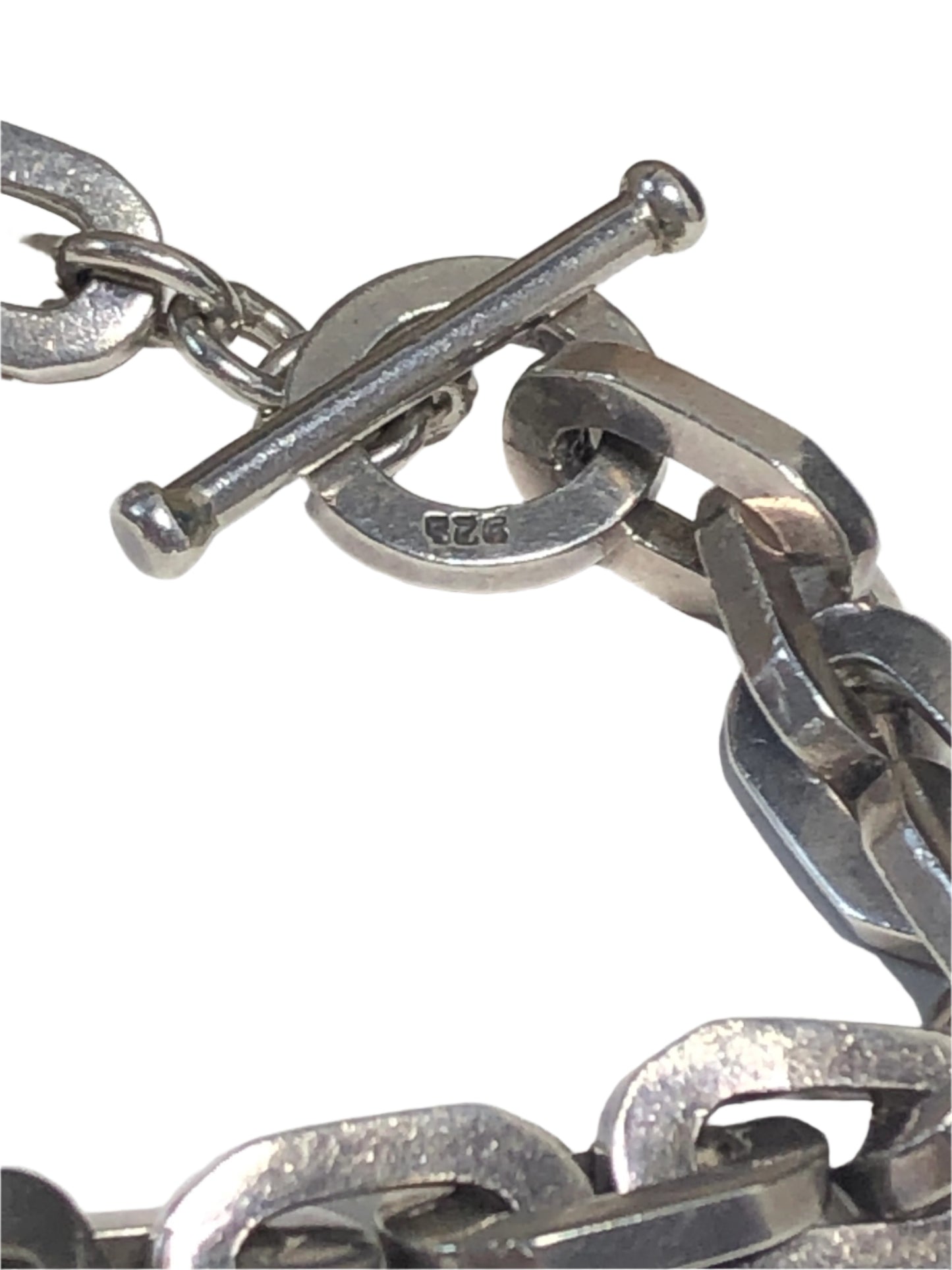 This vintage large-link sterling silver chain necklace is sure to make a statement. It will add a luxurious element to any outfit.