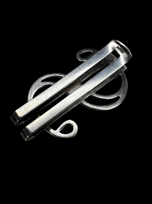 This vintage piece is crafted from sterling silver and designed to hold folded cash. If you're looking for a unique gift, this fits the bill.