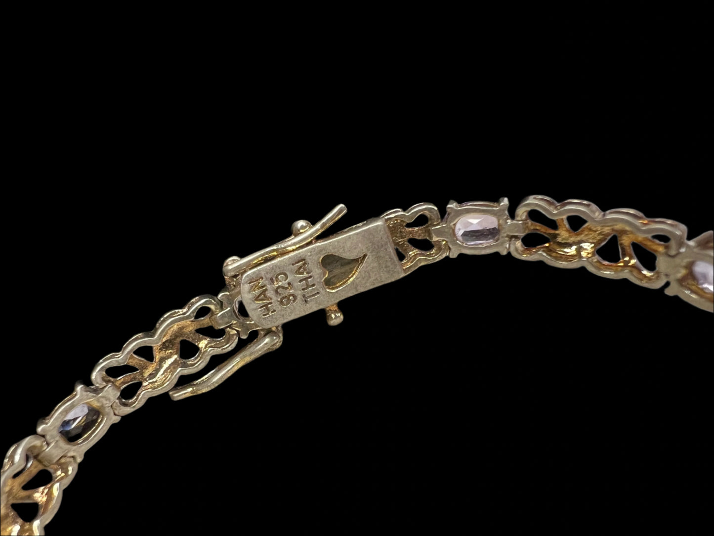 Add a gentle pop of color to your outfit with this elegant bracelet, which features amethysts.