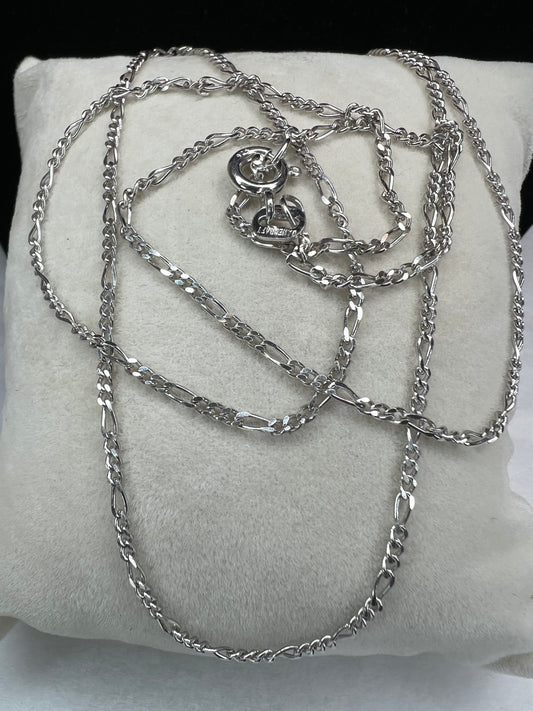 The classic look of the figaro link in this thin yet lengthy chain is just waiting for the perfect pendant to match your style.