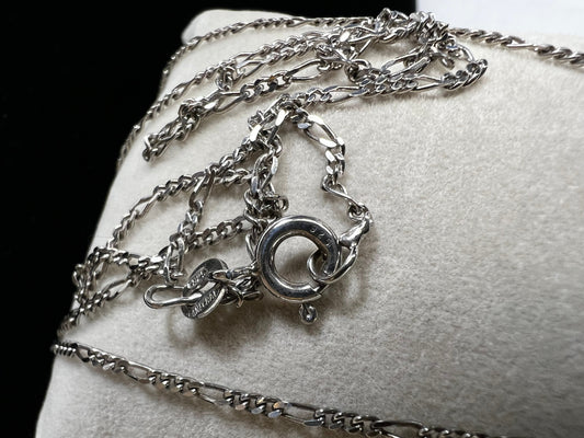 Elevate your style with this petite sterling silver chain. The classic figaro link will add a touch of class to any outfit.
