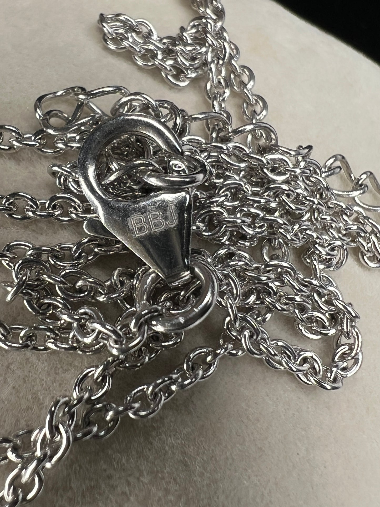 Add a subtle touch of sophistication with this petite sterling silver chain necklace. It features a classic cable link and is perfect either on its own or paired with a pendant.