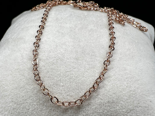 This dainty, elegant chain is perfect for adding a touch of sophistication to any outfit. It is made from sterling silver with a rose gold overlay.