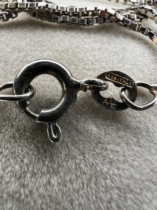 Add a gentle touch of elegance to your outfit with this sterling silver box chain necklace. Wear it alone or pair it with a pendant. Made in Italy.