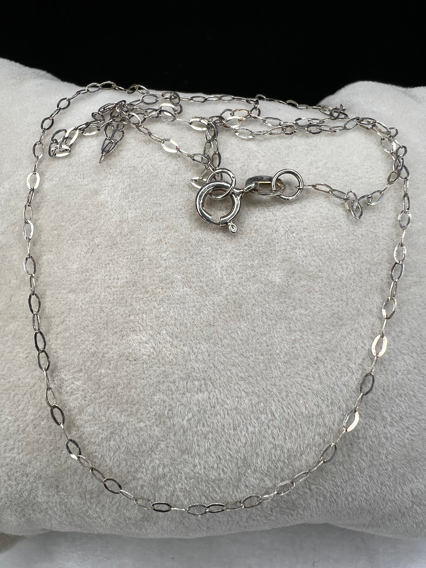 This petite sterling silver chain is sure to add a touch of elegance to your outfit. It is signed SVR.