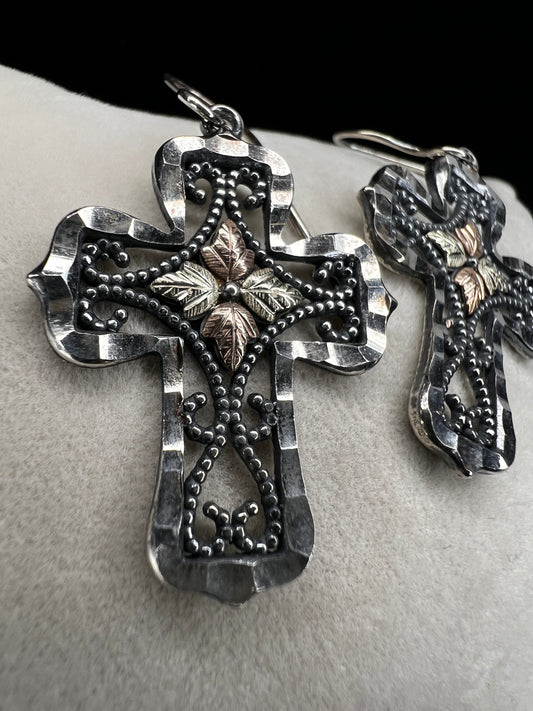 Crafted from sterling silver with a touch of yellow and rose gold, these earrings are emblematic of Black Hills gold pieces offered by Coleman Co. This pair is both beautiful and well-made.