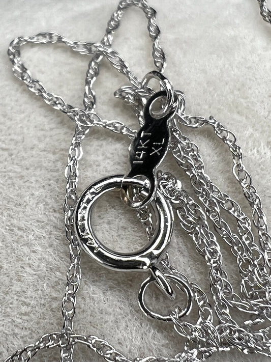 Here is a beautiful petite white gold chain ready to be paired with your favorite pendant or worn on its own. Either way, it will add a subtle touch of sophistication to your outfit.