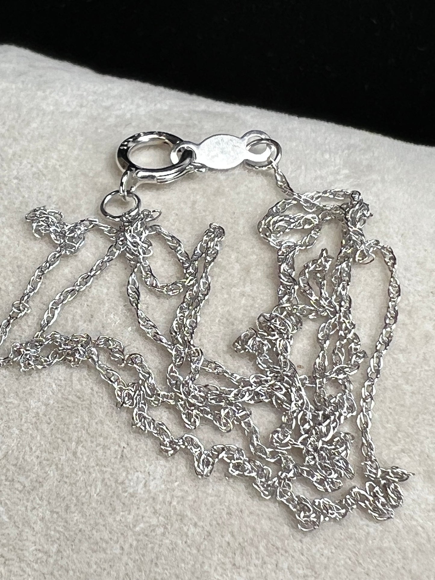 Here is a beautiful petite white gold chain ready to be paired with your favorite pendant or worn on its own. Either way, it will add a subtle touch of sophistication to your outfit.