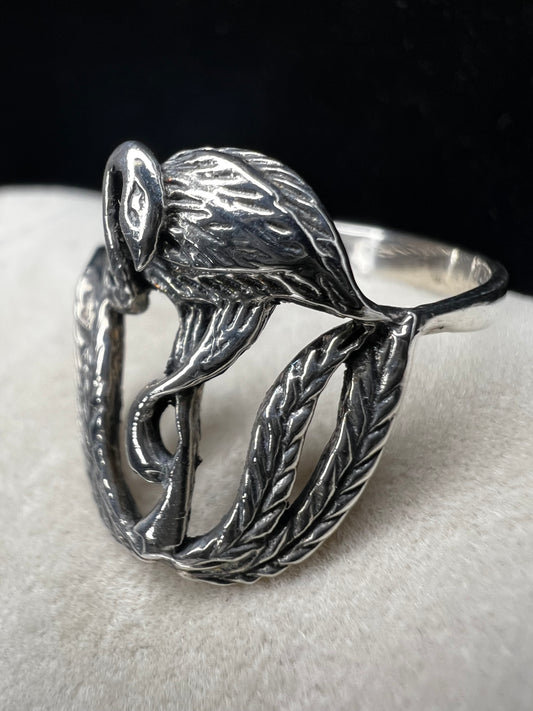Crafted from sterling silver, this ring features a blue heron that stands 3/4" tall. Perfect for a nature lover.