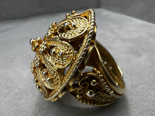 This remarkable antique ring, expertly made in Israel from sterling silver and finished with a gold wash, showcases exquisite early craftsmanship that is genuinely impressive.
