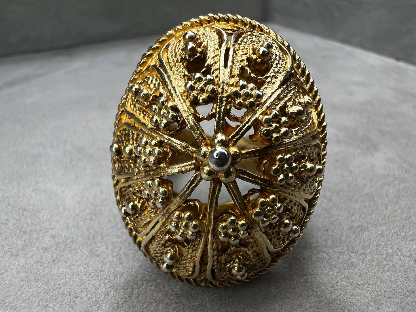 This remarkable antique ring, expertly made in Israel from sterling silver and finished with a gold wash, showcases exquisite early craftsmanship that is genuinely impressive.
