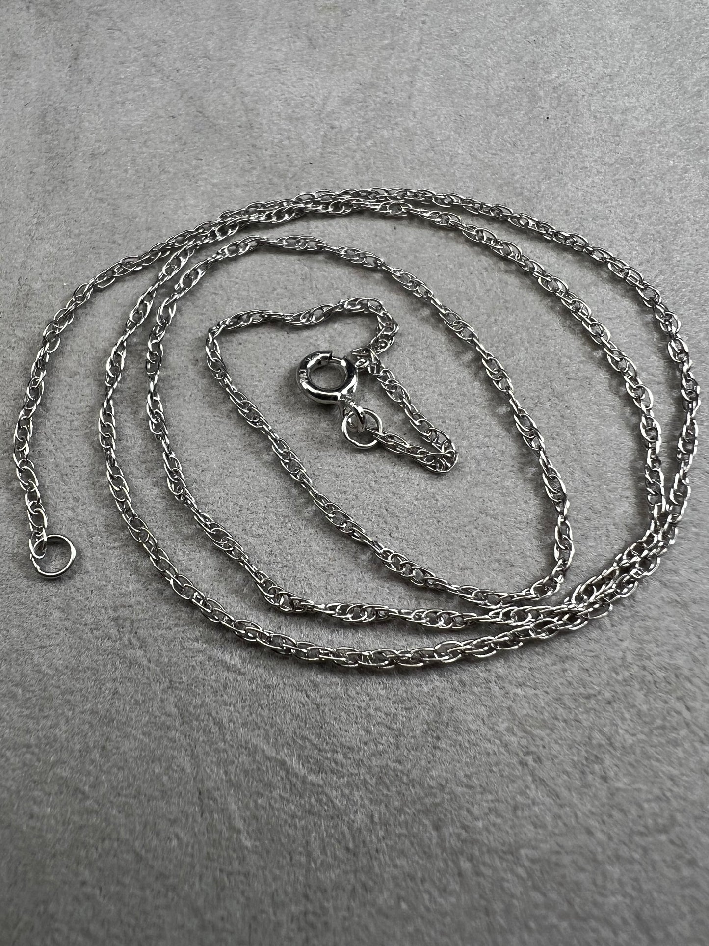 This 18" sterling silver chain offers a refined foundation for your favorite small pendants. It is perfectly balanced to complement delicate designs.