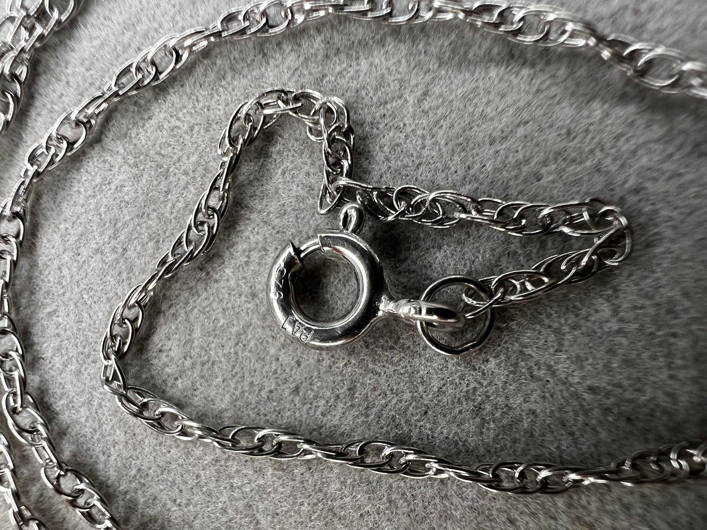 This 18" sterling silver chain offers a refined foundation for your favorite small pendants. It is perfectly balanced to complement delicate designs.