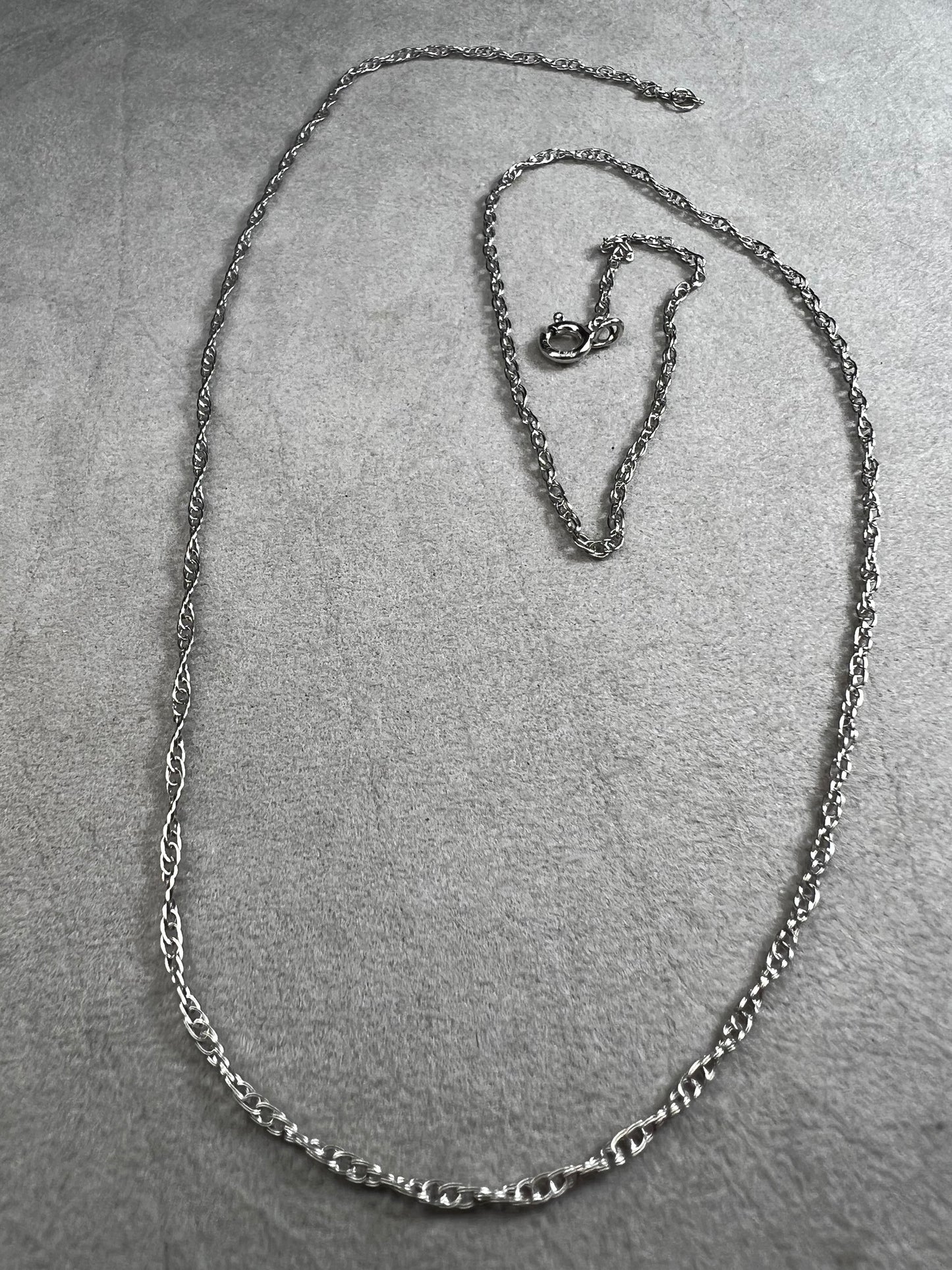 This 18" sterling silver chain offers a refined foundation for your favorite small pendants. It is perfectly balanced to complement delicate designs.