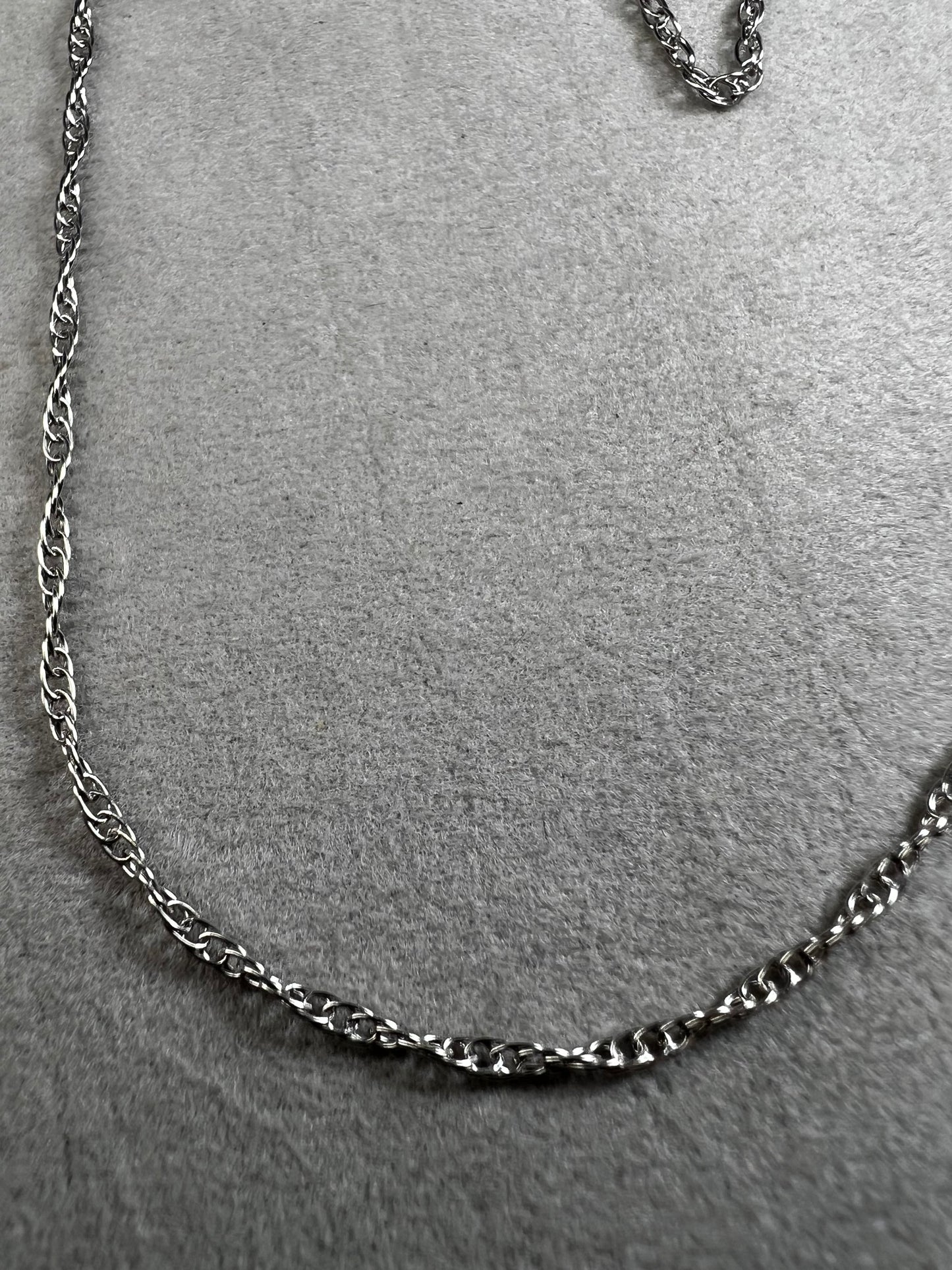 This 18" sterling silver chain offers a refined foundation for your favorite small pendants. It is perfectly balanced to complement delicate designs.
