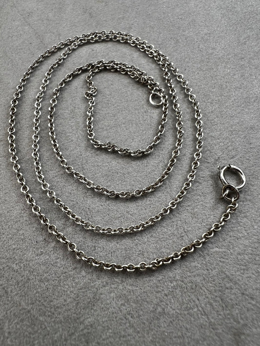 This sterling silver chain features a petite link. It is ready to be paired with a small pendant -- or wear it on its own for a touch of class.