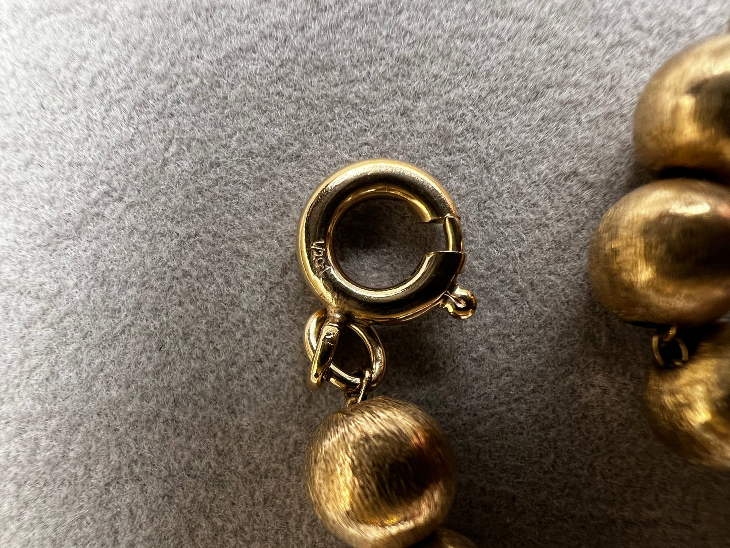 This 16" necklace features a gold-filled chain accented with gold-filled beads, designed to catch the light beautifully with every movement. It offers a refined yet versatile addition to elevate any wardrobe.