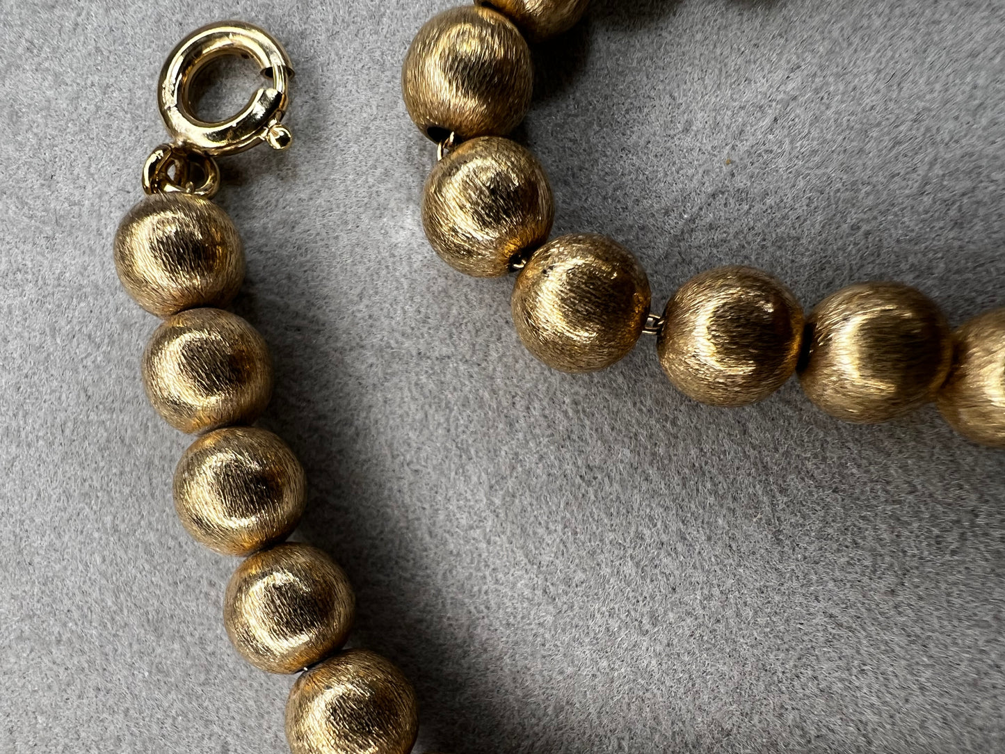 This 16" necklace features a gold-filled chain accented with gold-filled beads, designed to catch the light beautifully with every movement. It offers a refined yet versatile addition to elevate any wardrobe.