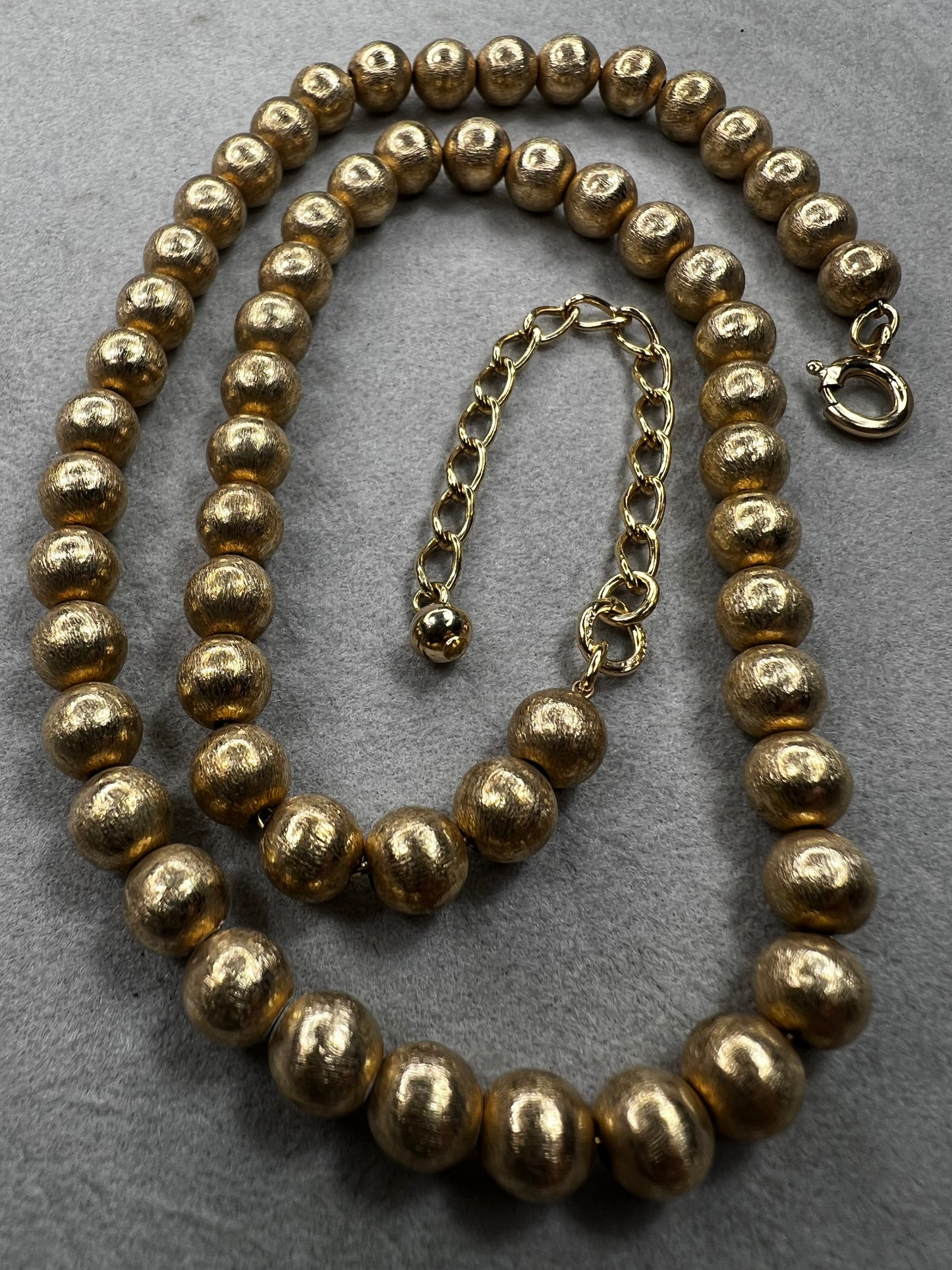 This 16" necklace features a gold-filled chain accented with gold-filled beads, designed to catch the light beautifully with every movement. It offers a refined yet versatile addition to elevate any wardrobe.