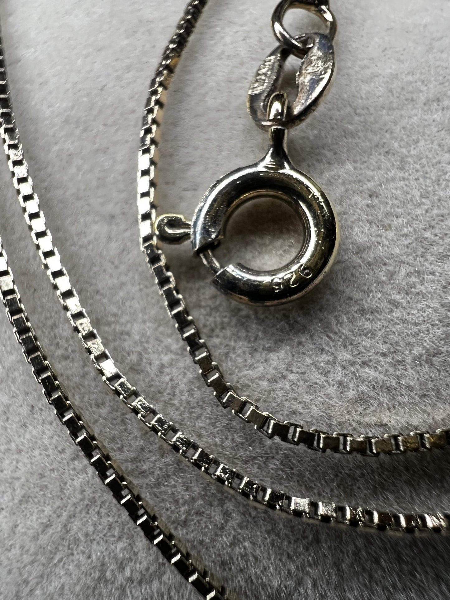 This petite chain, crafted form sterling silver with a gold finish, is built with a tough box link. Wear it alone or pair it with one of our gold-over-sterling pendants.