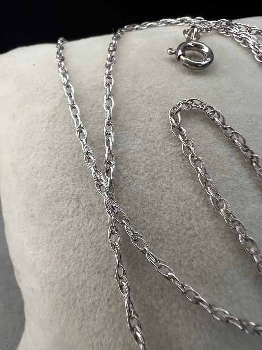This petite chain is crafted from sterling silver and is ready to be paired with one of our small silver pendants or charms.