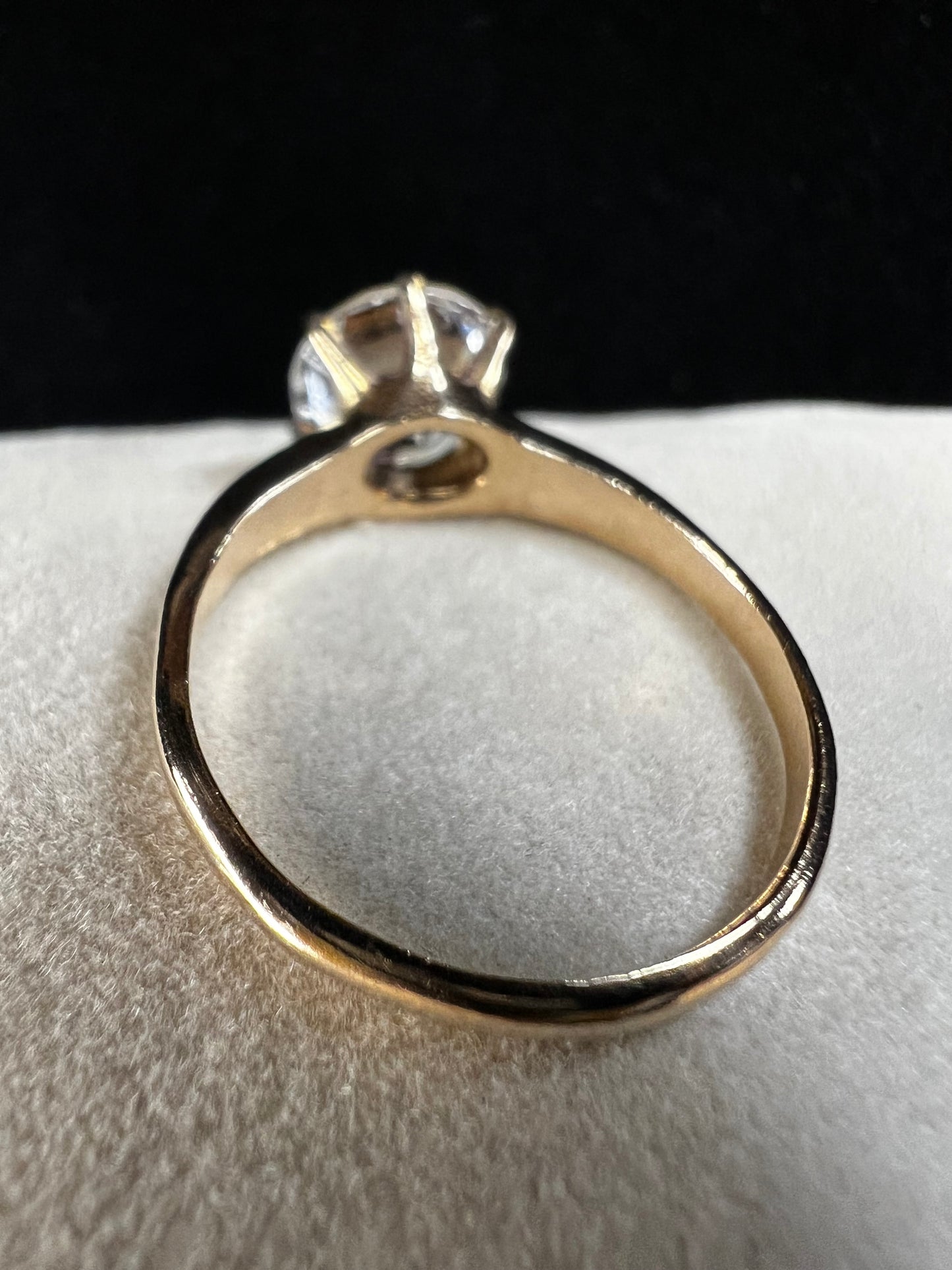 This gold-filled ring with a beautiful clear white spinel is fine piece of jewelry, as well as an affordable alternative to a diamond ring.