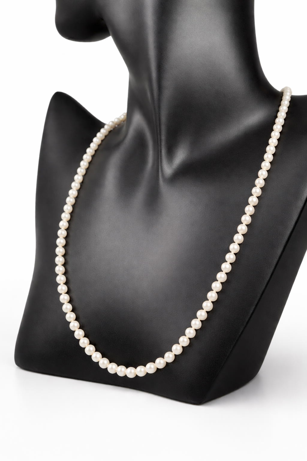 This designer necklace features cultured pearls and a detailed 14k gold clasp. Signed RAFKA, this necklace could be just what you're looking for. Perfect for any season.