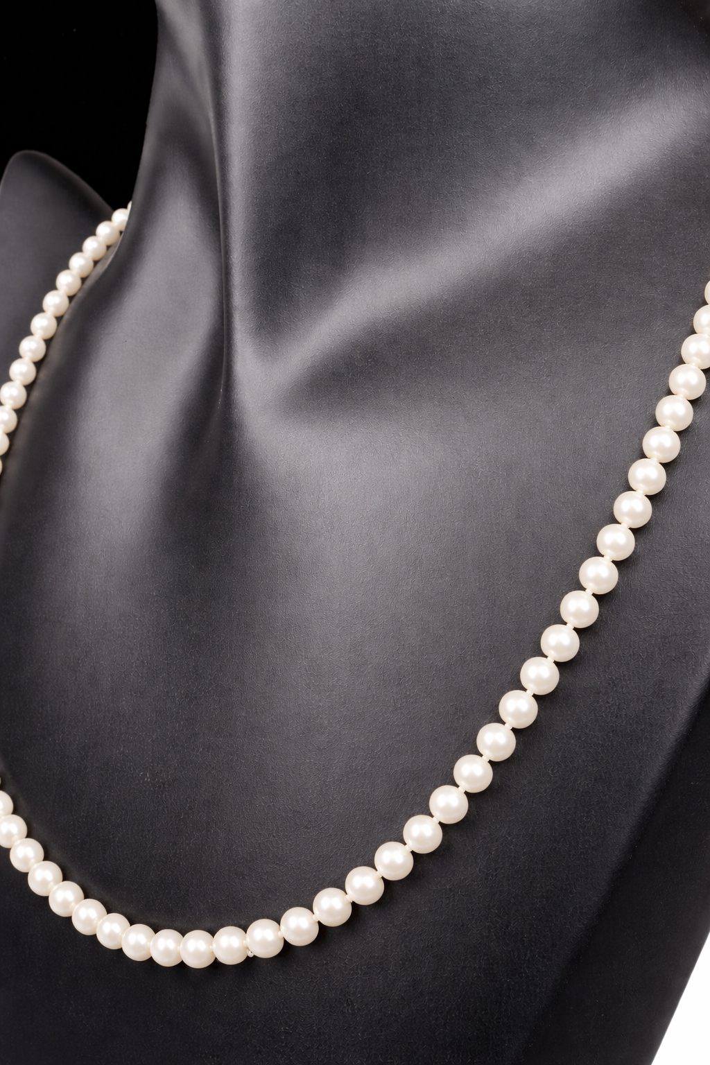 This designer necklace features cultured pearls and a detailed 14k gold clasp. Signed RAFKA, this necklace could be just what you're looking for. Perfect for any season.