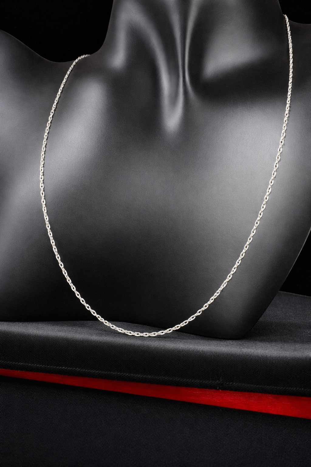 This petite chain is crafted from sterling silver and is ready to be paired with one of our small silver pendants or charms.