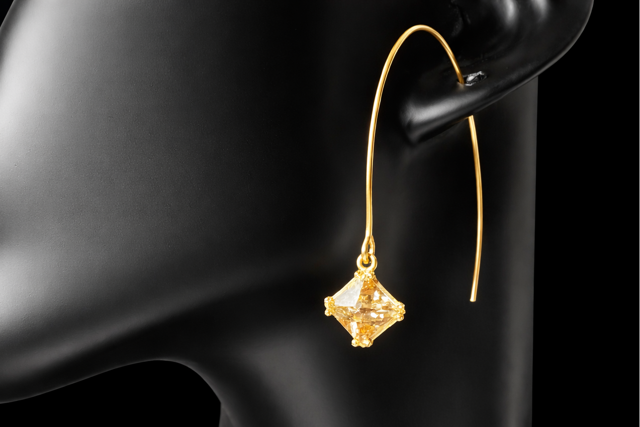 Crafted from sterling silver with a gold-wash finish, these uniquely designed earrings will be great for when you're looking for something a little different.
