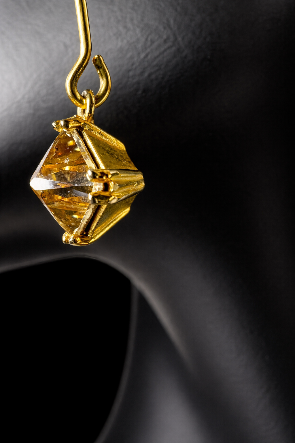 Crafted from sterling silver with a gold-wash finish, these uniquely designed earrings will be great for when you're looking for something a little different.