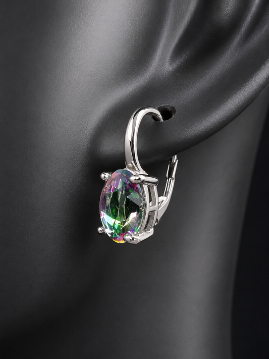 Elevate your everyday elegance with these stunning sterling silver mystic topaz earrings. Each piece showcases a radiant lab-created mystic topaz stone measuring 10 mm x 8 mm, displaying mesmerizing rainbow hues that catch the light beautifully. Crafted from genuine sterling silver, these earrings offer a perfect balance of sophistication and eye-catching sparkle.