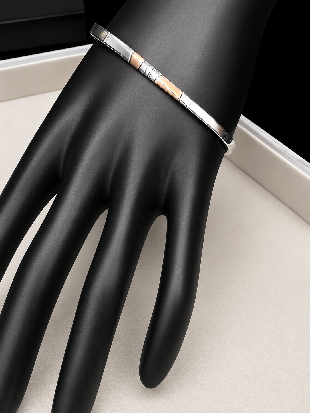 Here is an elegant vintage sterling silver bracelet featuring inlaid copper accents and hand-etched detailing. The distinctive rectangular design creates a modern yet timeless aesthetic, making this piece a standout addition to any jewelry collection.