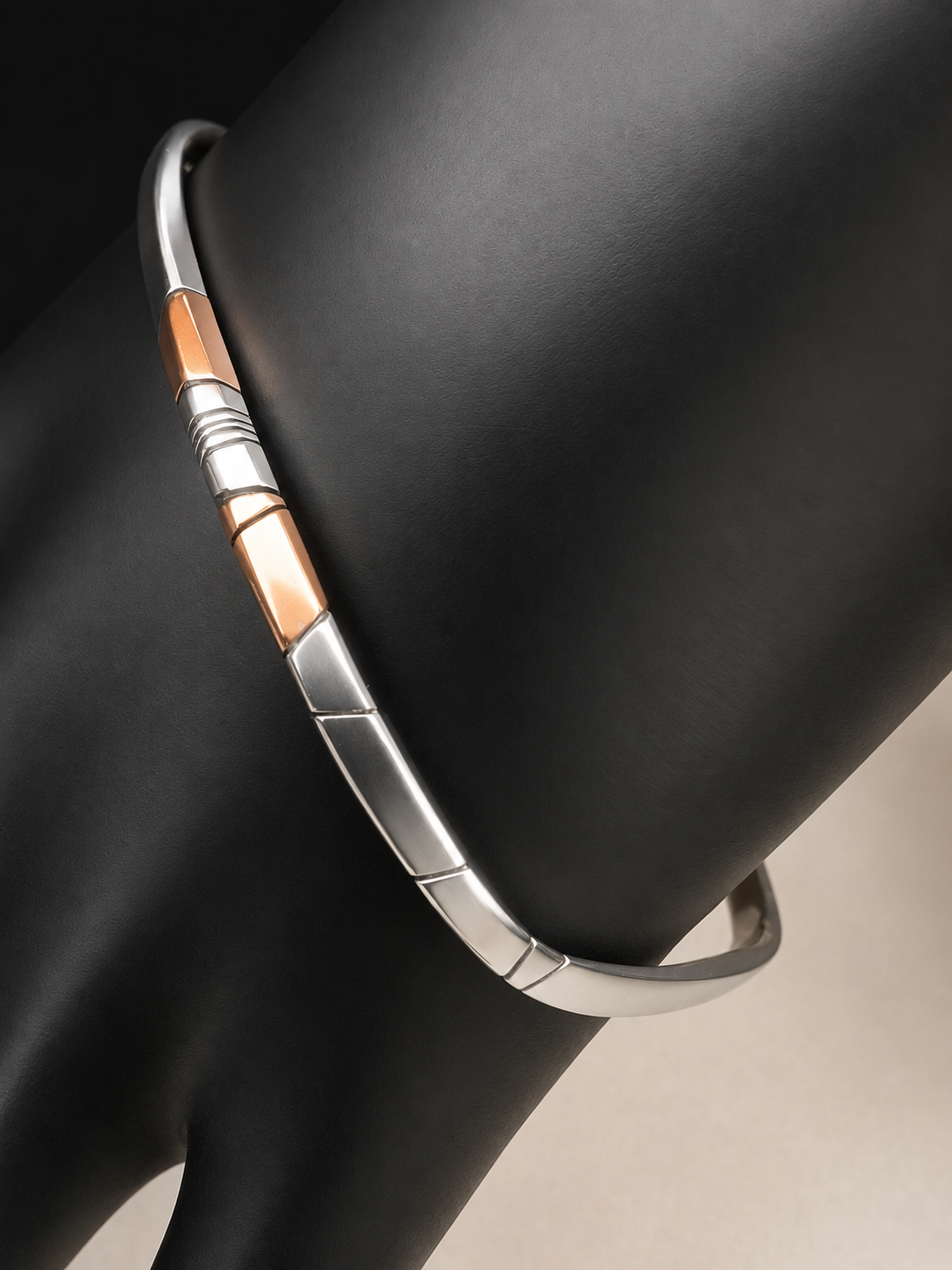 Here is an elegant vintage sterling silver bracelet featuring inlaid copper accents and hand-etched detailing. The distinctive rectangular design creates a modern yet timeless aesthetic, making this piece a standout addition to any jewelry collection.