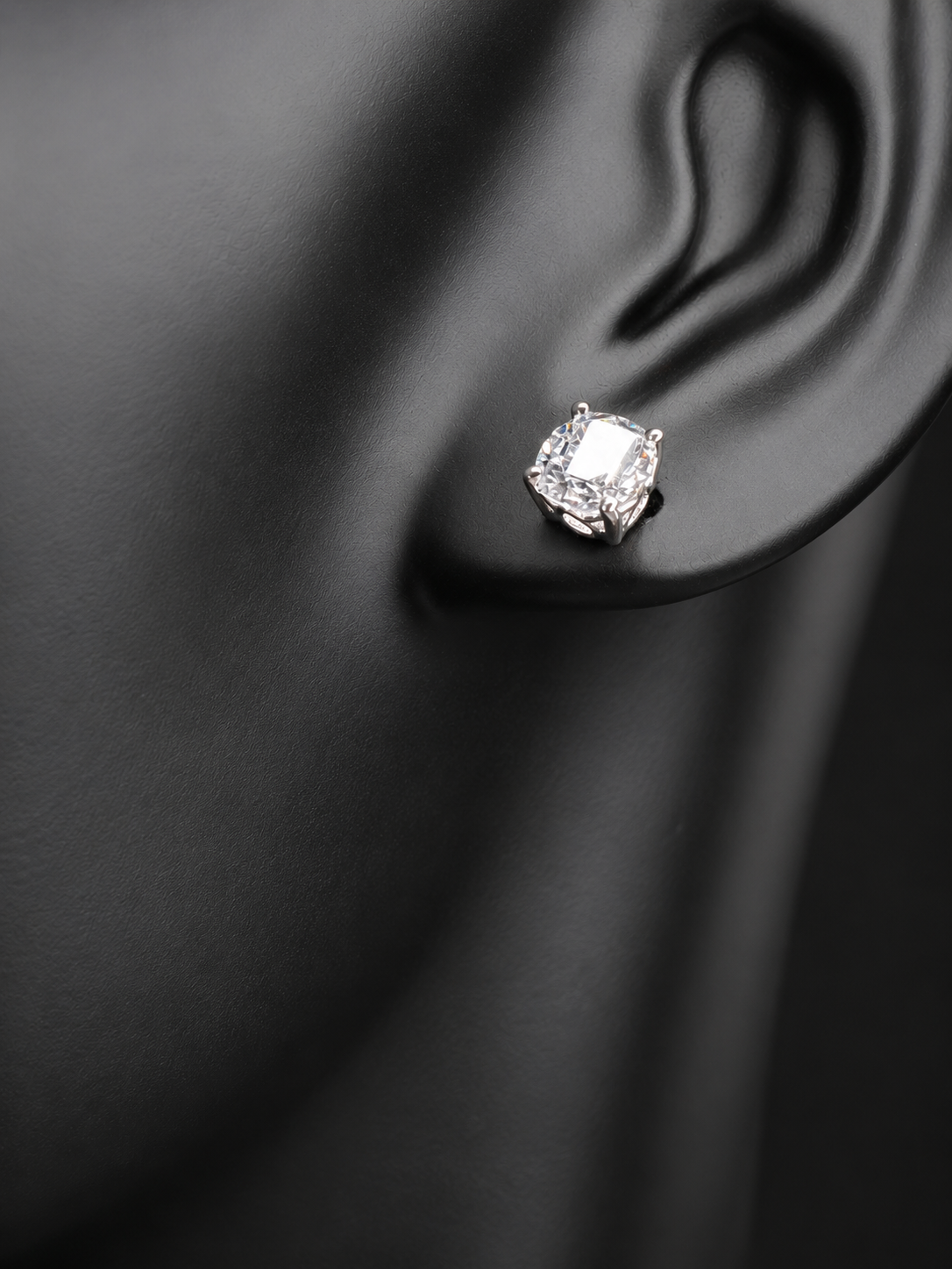 These sterling silver and CZ earrings combine timeless elegance with modern sparkle. Each piece features a generous 6 mm cubic zirconia stone set in premium sterling silver, delivering brilliant shine at a fraction of the cost of diamonds. Perfect for everyday wear or special occasions, these earrings offer versatile style that complements any wardrobe.