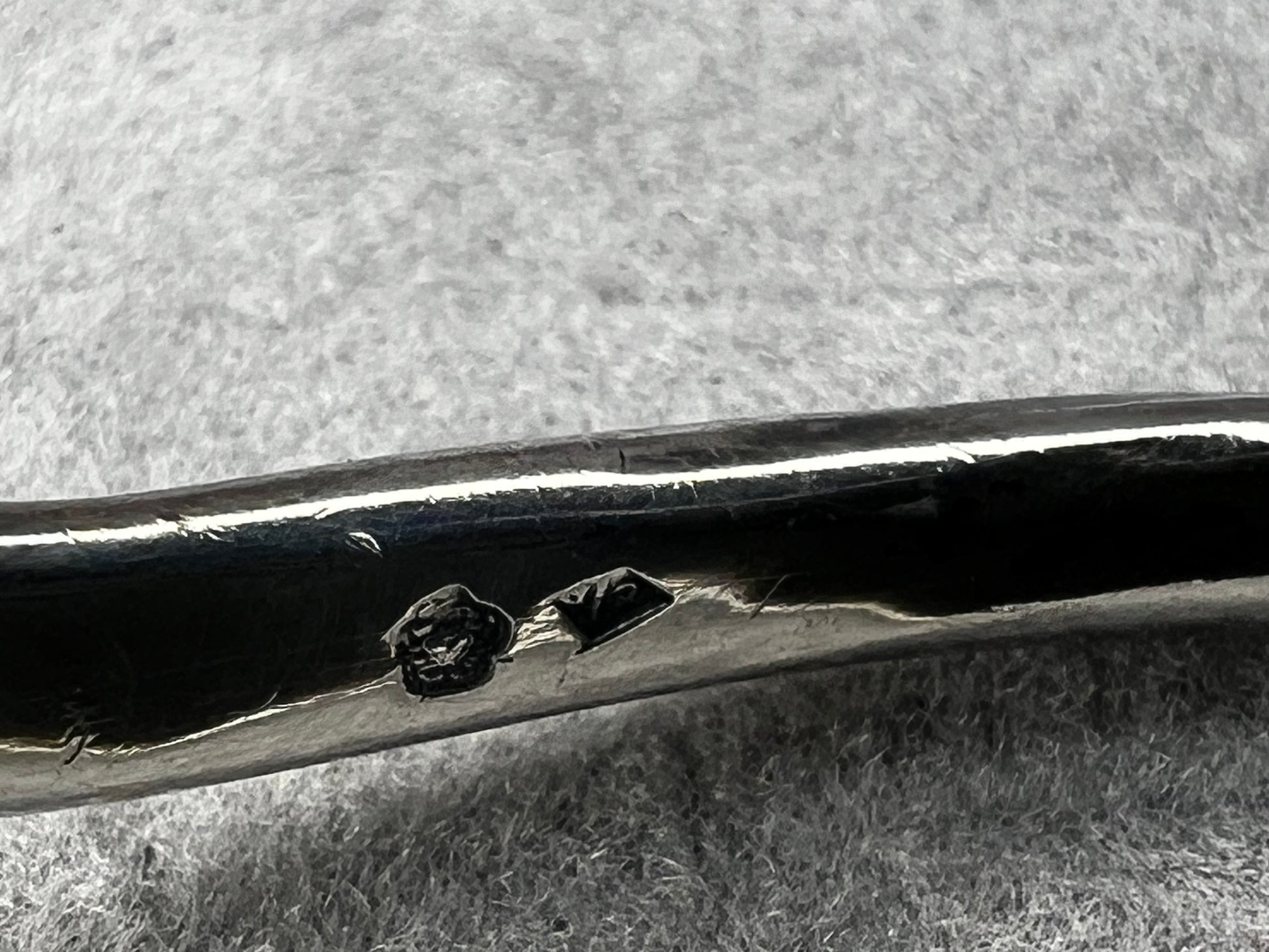 This slide pendant necklace features a large onyx and sterling pendant front and center with a sterling collar. From native American silversmith L. James.