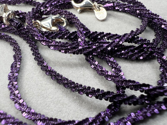 These are sterling silver chains with a purple enamel finish to give you a unique fine jewelry option. All three are being sold together because they look great layered, but they also work as individual pieces.