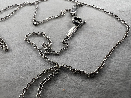 This vintage sterling silver chain by Elsa Peretti for Tiffany &amp; Co. offers a rare opportunity to acquire a distinguished piece of jewelry history. Its petite design exemplifies refined craftsmanship and timeless elegance. Made in Spain.