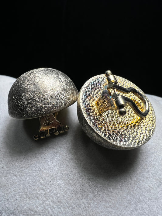 These earrings are crafted from sterling silver with a gold gilt overlay. Made in Italy.