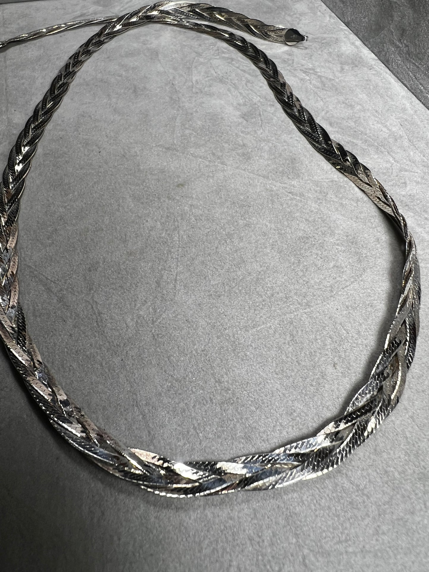 This braided sterling silver necklace is tough enough to hold your favorite heavy pendant but stylish enough to shine all on its own.