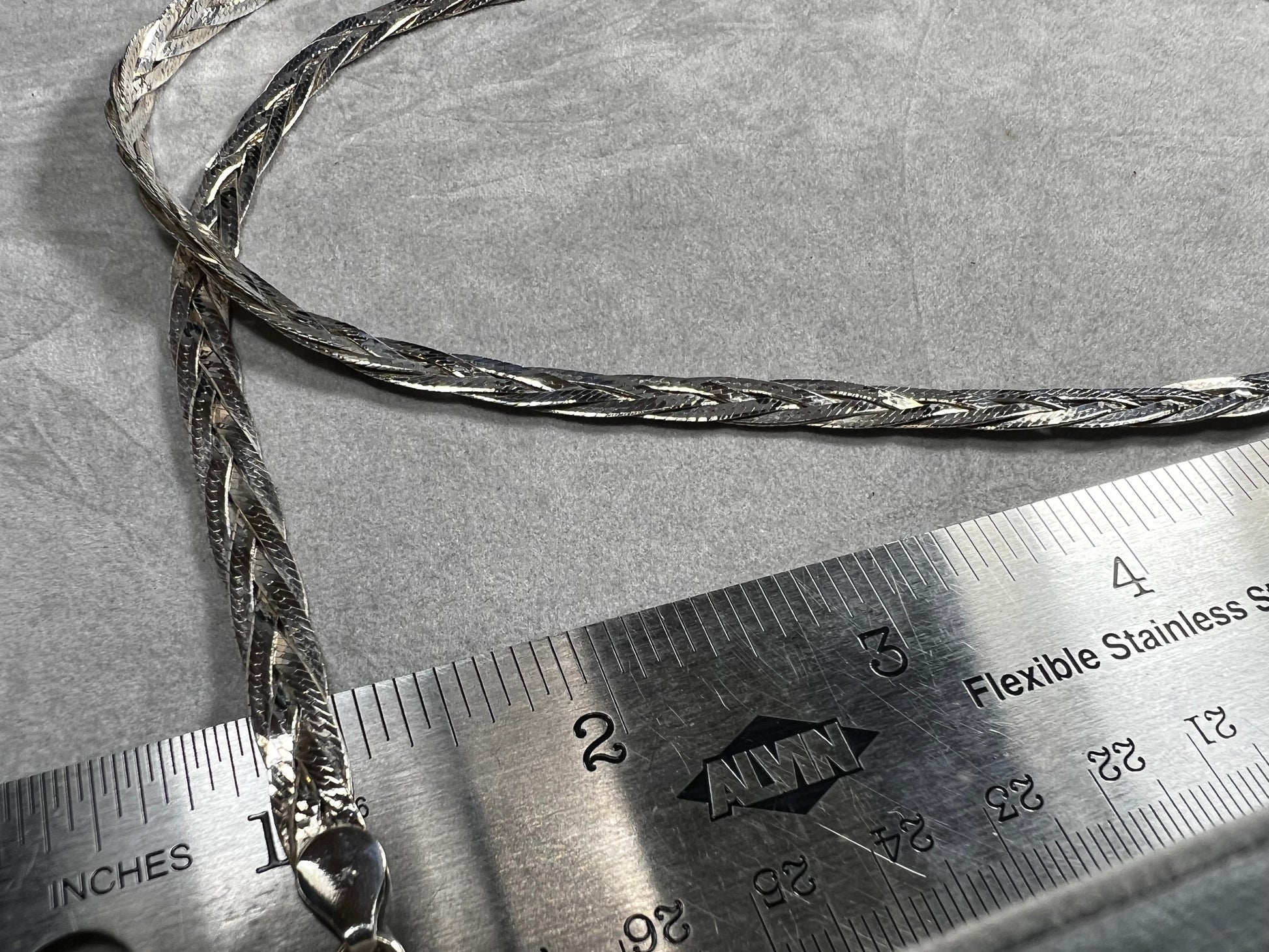 This braided sterling silver necklace is tough enough to hold your favorite heavy pendant but stylish enough to shine all on its own.