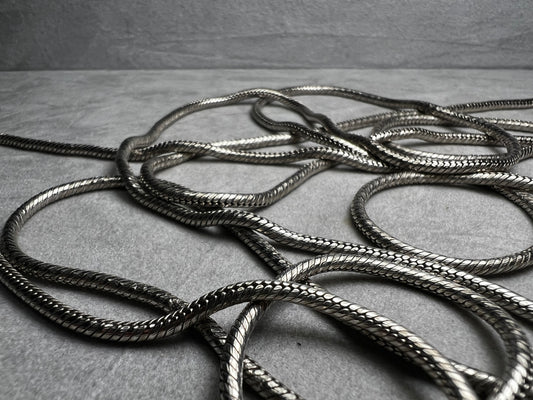 This exquisite Milor necklace measures an impressive 60 inches, offering versatile styling options. Crafted of sterling silver, this piece will enhance any outfit.