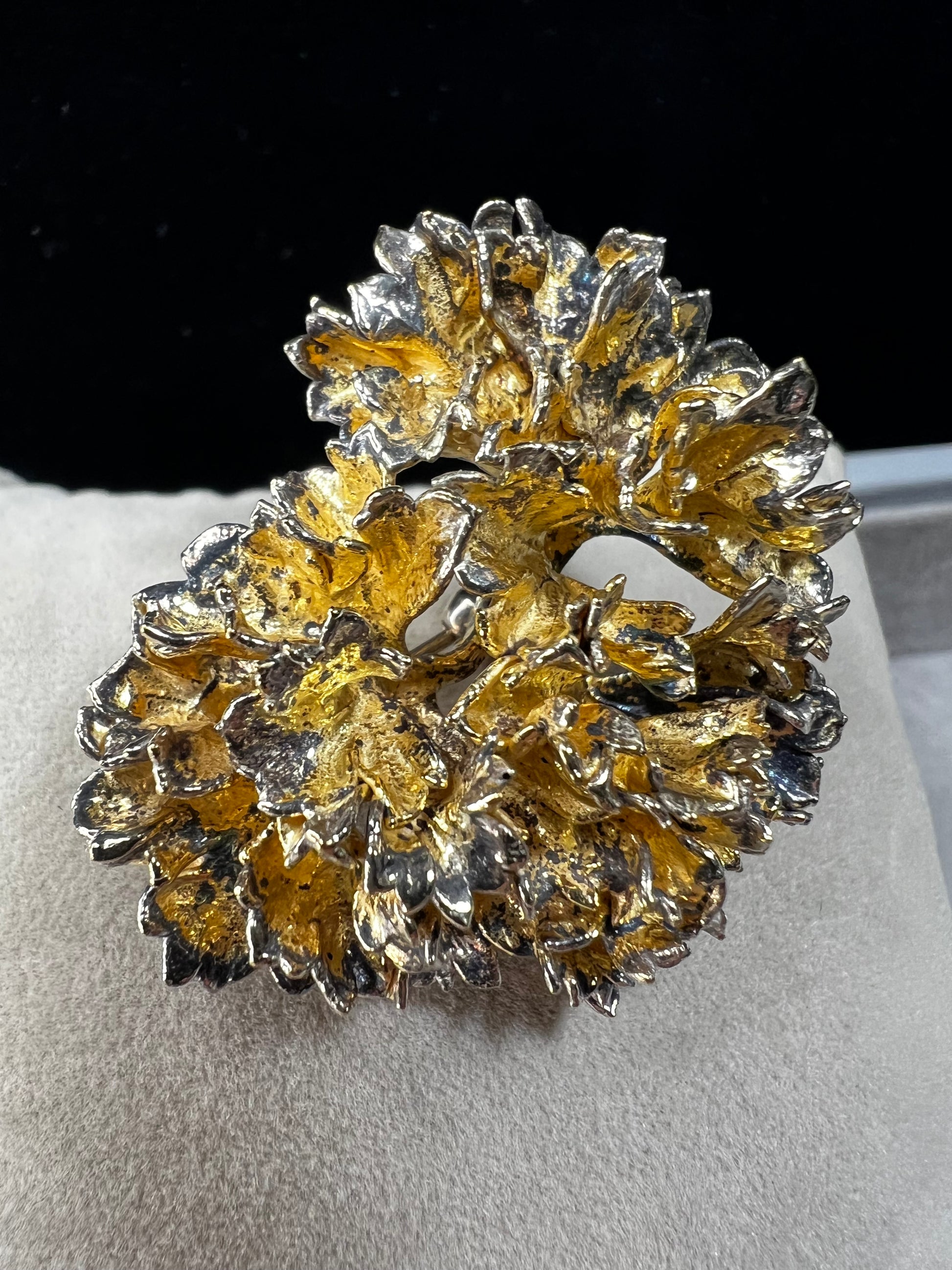 This is an elegant mid-century Flora Danica parsley brooch handcrafted in sterling silver with a warm gold-wash finish. It's a timeless accessory perfect for collectors of vintage Scandinavian jewelry or anyone who appreciates fine craftsmanship and nature-inspired design. Signed Eggert Denmark.