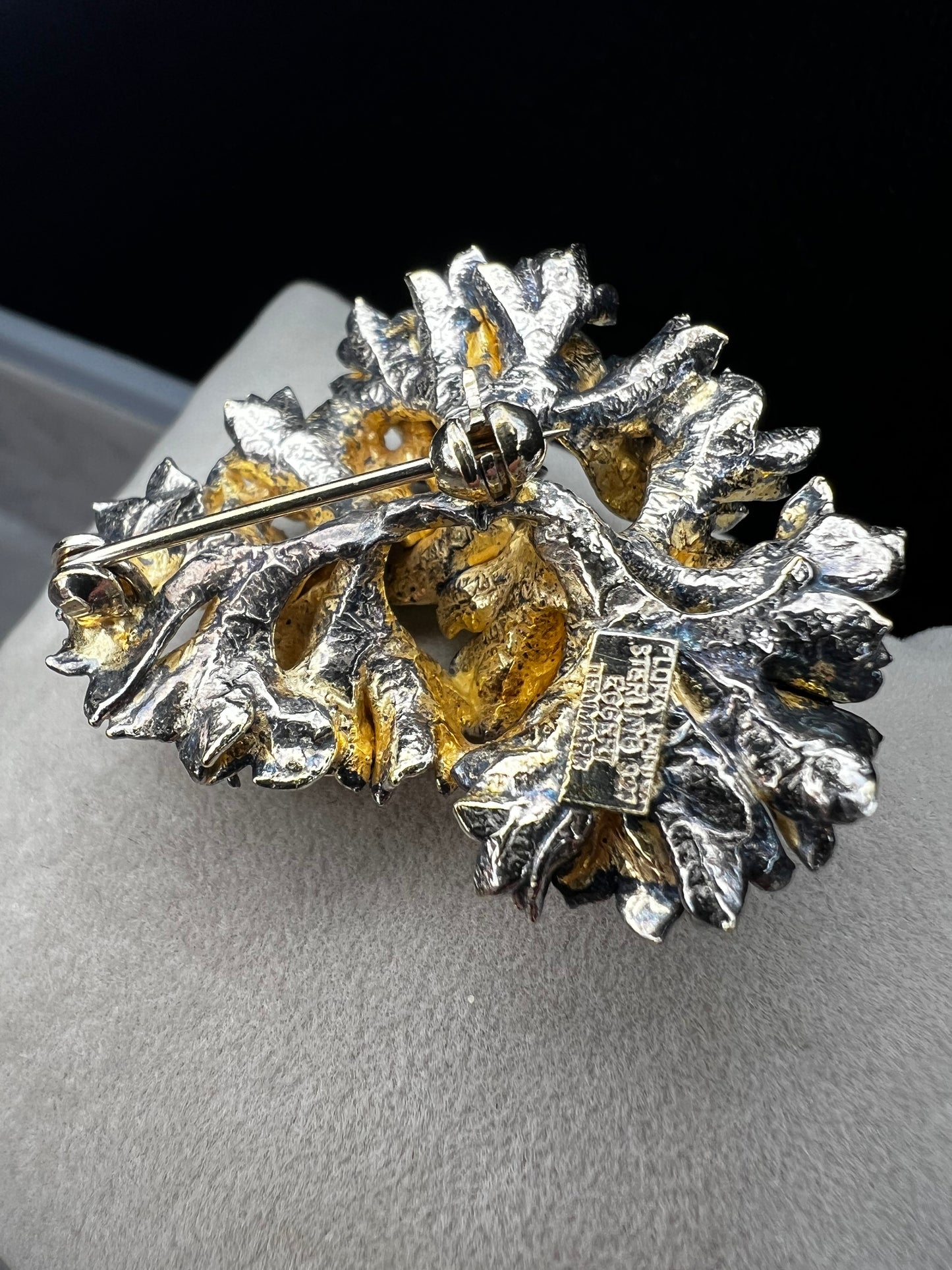 This is an elegant mid-century Flora Danica parsley brooch handcrafted in sterling silver with a warm gold-wash finish. It's a timeless accessory perfect for collectors of vintage Scandinavian jewelry or anyone who appreciates fine craftsmanship and nature-inspired design. Signed Eggert Denmark.