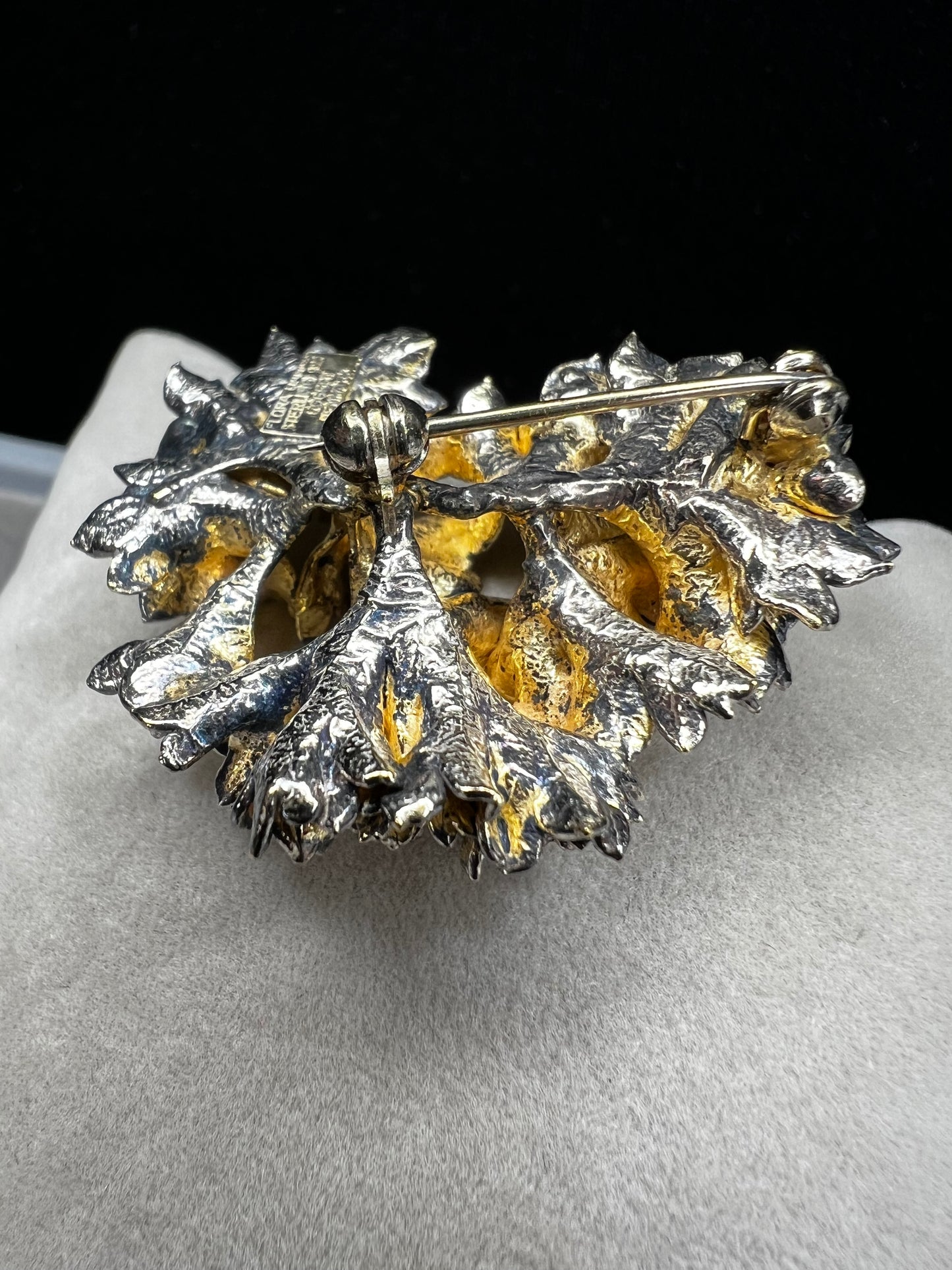 This is an elegant mid-century Flora Danica parsley brooch handcrafted in sterling silver with a warm gold-wash finish. It's a timeless accessory perfect for collectors of vintage Scandinavian jewelry or anyone who appreciates fine craftsmanship and nature-inspired design. Signed Eggert Denmark.