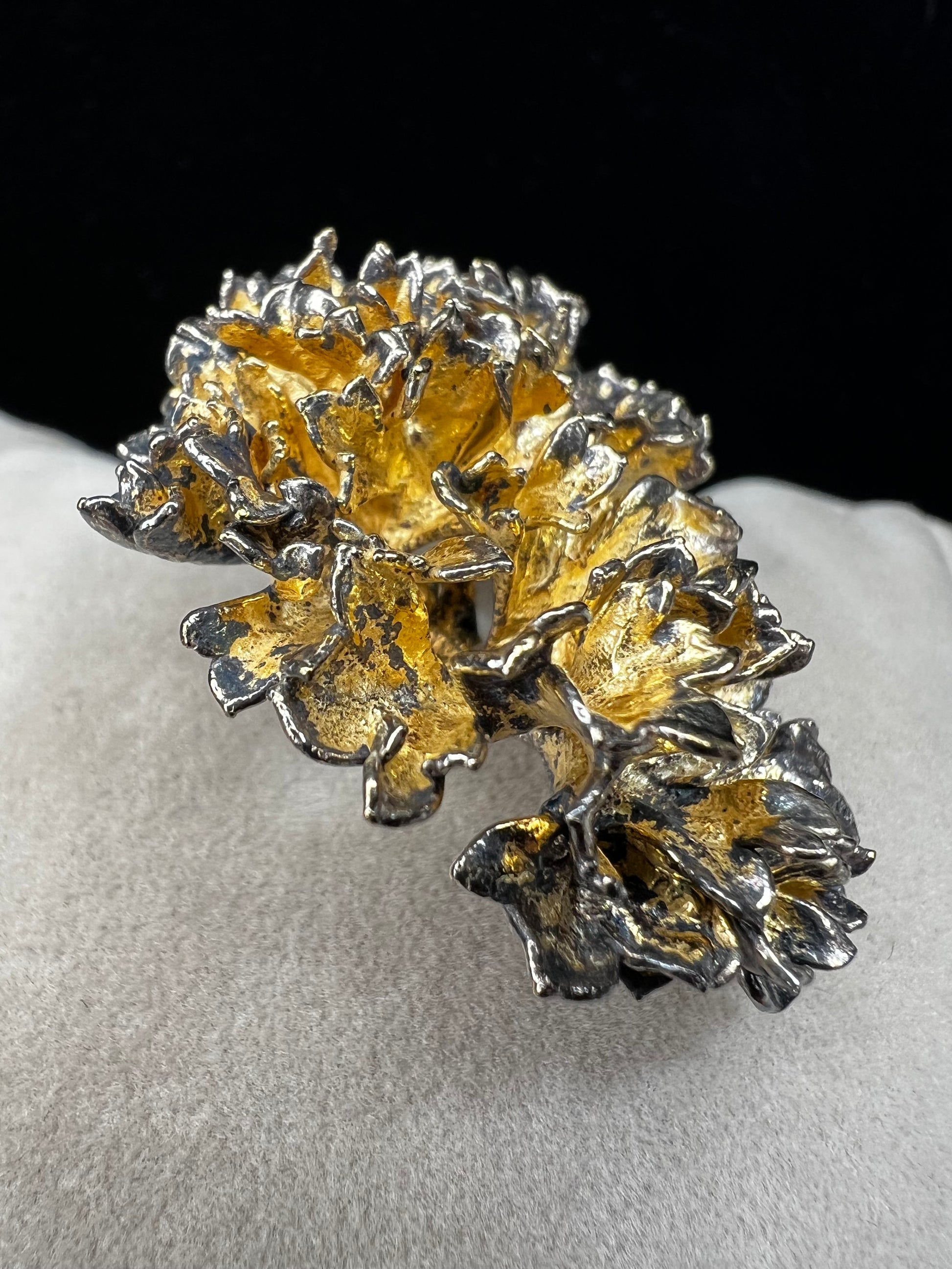 This is an elegant mid-century Flora Danica parsley brooch handcrafted in sterling silver with a warm gold-wash finish. It's a timeless accessory perfect for collectors of vintage Scandinavian jewelry or anyone who appreciates fine craftsmanship and nature-inspired design. Signed Eggert Denmark.