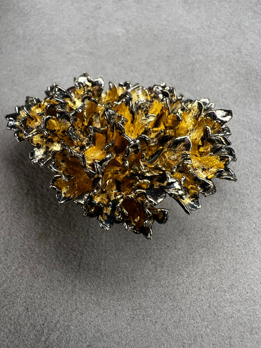 This is an elegant mid-century Flora Danica parsley brooch handcrafted in sterling silver with a warm gold-wash finish. It's a timeless accessory perfect for collectors of vintage Scandinavian jewelry or anyone who appreciates fine craftsmanship and nature-inspired design. Signed Eggert Denmark.