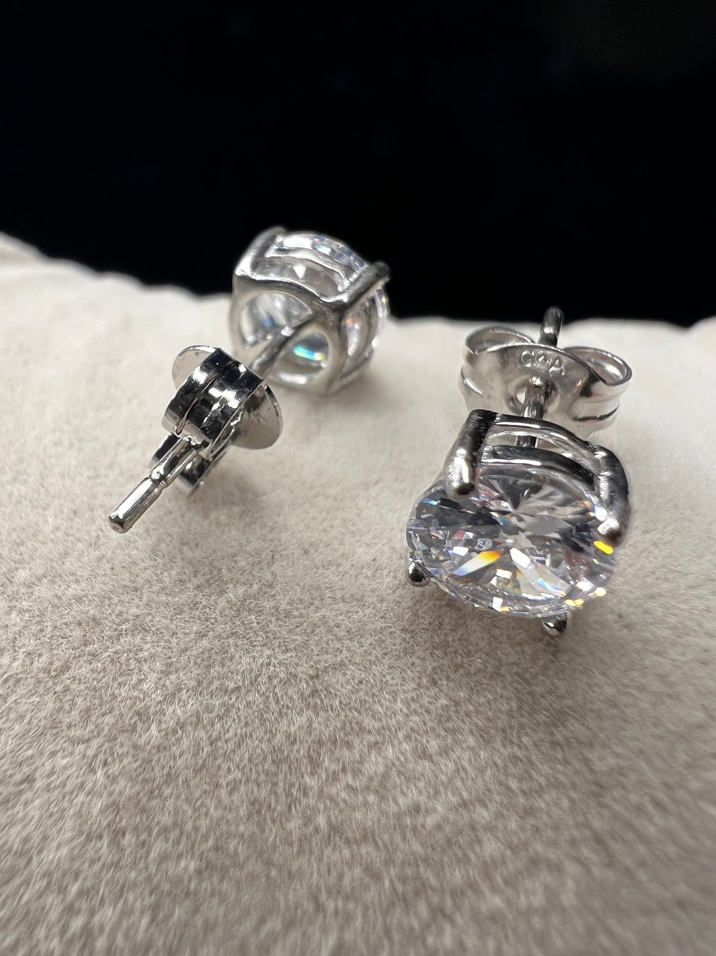 Elevate your everyday look with these timeless sterling silver 6 mm CZ stud earrings. Each pair features brilliant cubic zirconia stones that sparkle with diamond-like clarity. The perfect size for versatile wear ... understated enough for the office, radiant enough for special occasions.