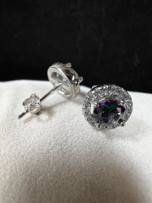 Accented with a halo of sparkling cubic zirconia, these sterling silver earrings frame their mystic quartz centers with brilliant light-catching detail.